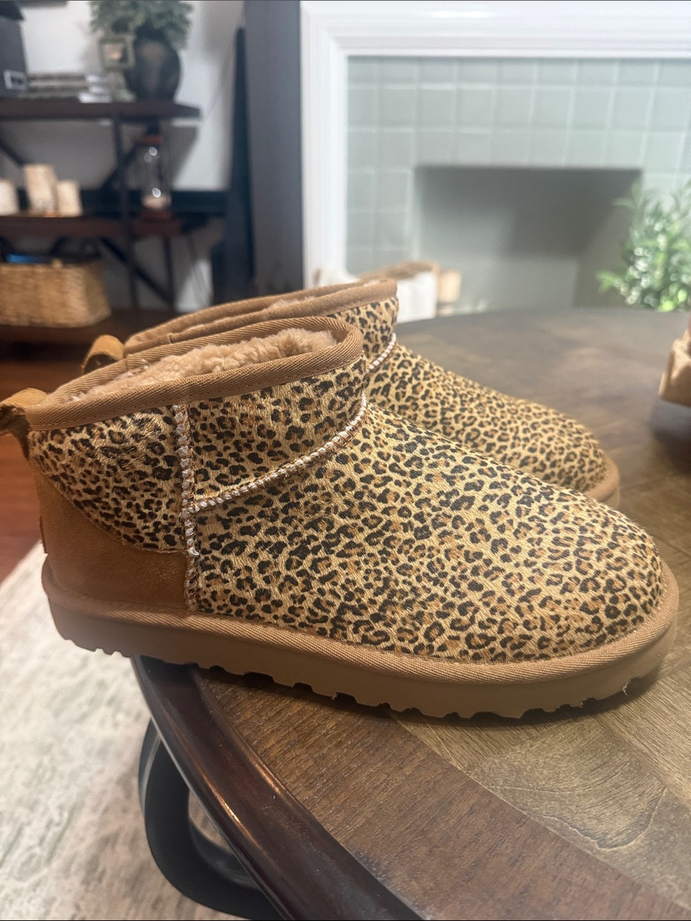 UGG women’s Leopard-Print Cozy Slip-On boots in Brown